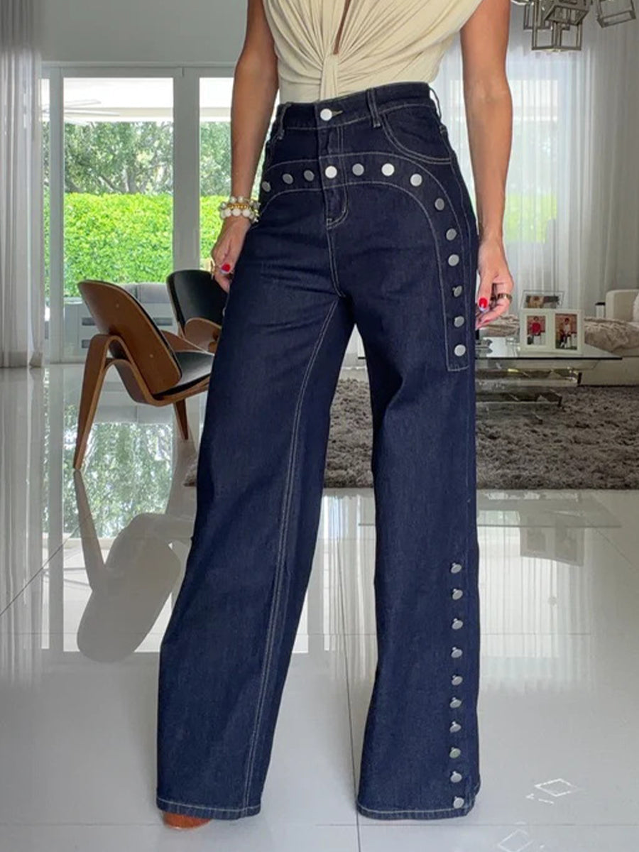 High-waisted wide-leg jeans with silver buttons and contrast stitching
