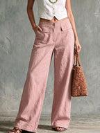 High-rise cotton and linen wide-leg trousers with flap pockets