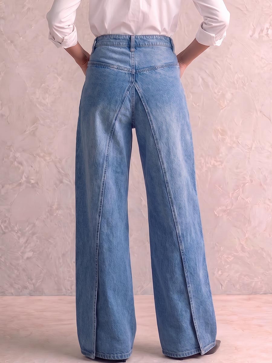 Vida jeans med hög midja och öppen V-skärning i midjan