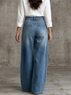 High-rise wide-leg jeans with military-style metal buttons