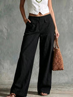 High-rise cotton and linen wide-leg trousers with flap pockets