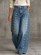 High-rise wide-leg jeans with military-style metal buttons
